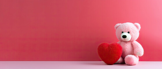 teddy bear with red heart on red background banner with copy space, gift for valentine's day concept