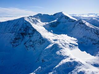Aerial Winter view of Rila mountain near Musala peak, Bulgaria