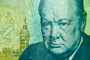 London, UK, 2 January 2024: British five pounds sterling banknote  closeup with selective focus. Portrait of Sir Winston Churchill, Prime Minister of the United Kingdom 