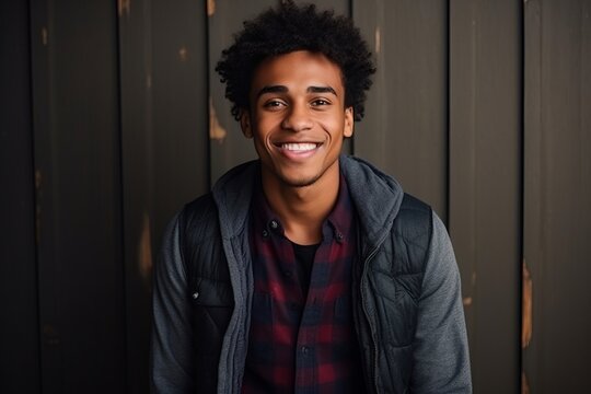 Portrait of a handsome young african american man smiling at the camera