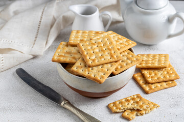 Crispy crackers in bowl. Crispy dry biscuits.