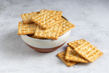 Crispy crackers in bowl. Crispy dry biscuits.