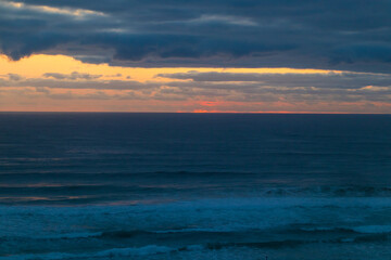 A Golden Dawn Breaks Over Gold Coast’s Tranquil Sea