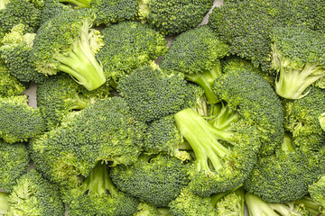 Texture of fresh broccoli cabbages as background