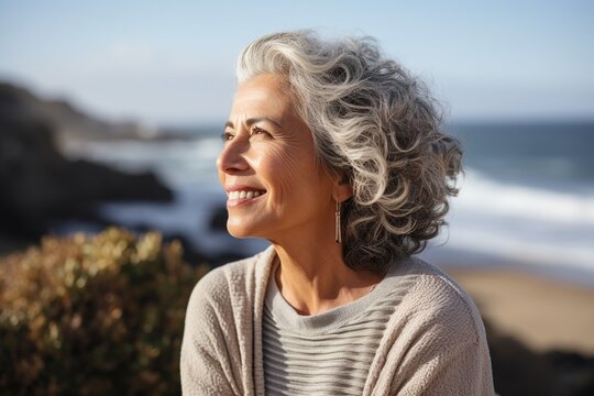 Portrait Of A Happy Mature Woman With Grey Hair Smiling And Looking Away