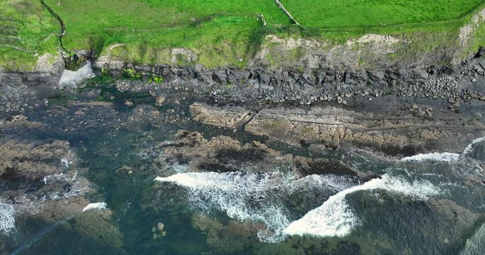 The stone coast of the Atlantic Ocean in 4k