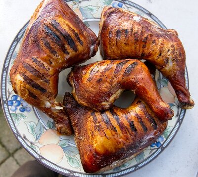 Whole chicken legs smoked and grilled, top down view
