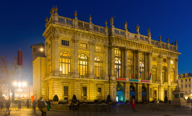 Fototapeta na wymiar Illuminated facade of Palazzo Madama in Turin at night, Italy