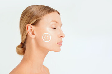 Obraz na płótnie Canvas Beauty woman face with spf sunscreen. Skincare treatment, facial lotion anti aging.
