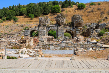 Ancient ruins of an aqueduct in the city of Ephesus. Background with selective focus and copy space