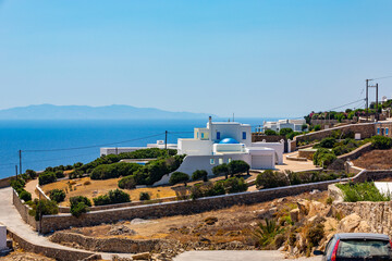 Panorama of traditional greek village with white houses on Mykonos Island, Greece, Europe - 711114782