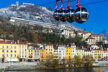 Image of aerial view of Grenoble with French Alps and cable car, France