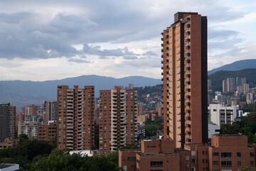 Fototapeta na wymiar wide city landscape of residential apartment buildings in medellin colombia