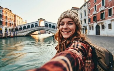 Fototapeta na wymiar Venetian Adventure: A Young Native Woman, Backpack Adorned, Captures the Joy of Traveling with a Selfie near a Venice Bridge - A Genuine Smile Amidst Italian Heritage.
