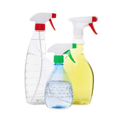 Plastic spray bottles with liquid isolated on white