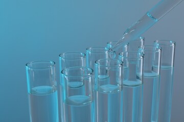 Laboratory analysis. Dripping liquid from pipette into glass test tube on light blue background, closeup