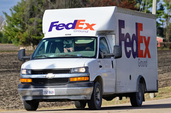 A FedEx Ground truck making deliveries in a rural section of northeastern Illinois. FedEx and FedEx Ground are recognizable names of the former Federal Express Corporation.