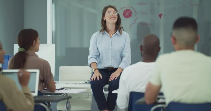 Students, question and hands up to lecturer in classroom, biology lesson and anatomy in university. People, diversity and college in learning or education, teaching and answer to knowledge on campus