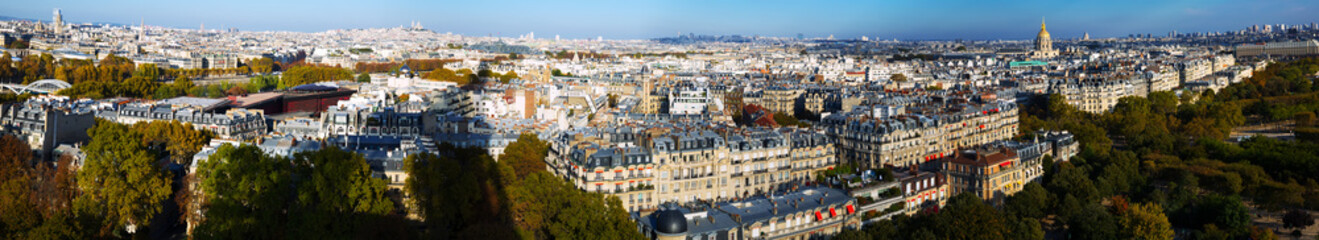 Panorama of Paris autumn cityscape with gilded dome of Hotel des Invalides in sunny day, France