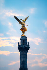 The Angel of Independence statue placed on Promenade of the Reform in Mexico city between tall...