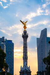The Angel of Independence statue placed on Promenade of the Reform in Mexico city between tall...