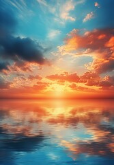 Fototapeta premium Radiant sunrise over a calm sea