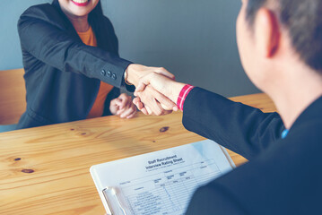 Businessman job interview by human resource HR officer interviwing, talk new employee shaking hands...