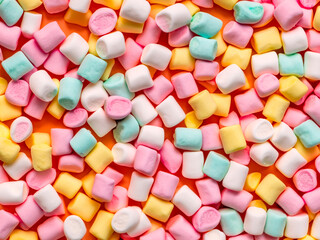 Fototapeta na wymiar many colorful candies on a white background
