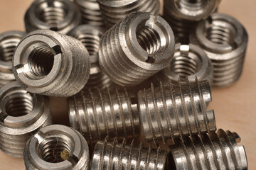 Stainless steel fine thread wood insert. Composite and polymer panels threaded insert. Internal...
