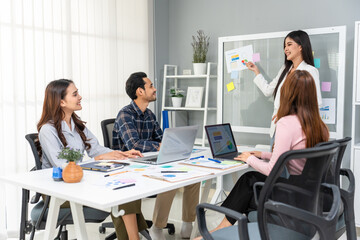 Group of Asian businessman and businesswoman working in the office. 