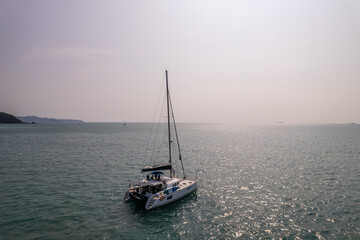 Fototapeta premium Aerial view of luxury private motor yacht on the ocean during summer. 