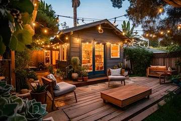 Poster Cozy backyard modern home festooned with garlands in evening, place to relax, generative ai. © inspiretta