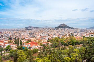 Fototapeta na wymiar The beautiful city of Athens, Greece from the top of a mountain
