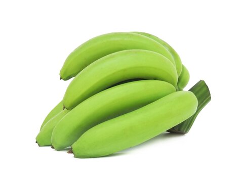 Fresh green raw bananas isolated on white background.