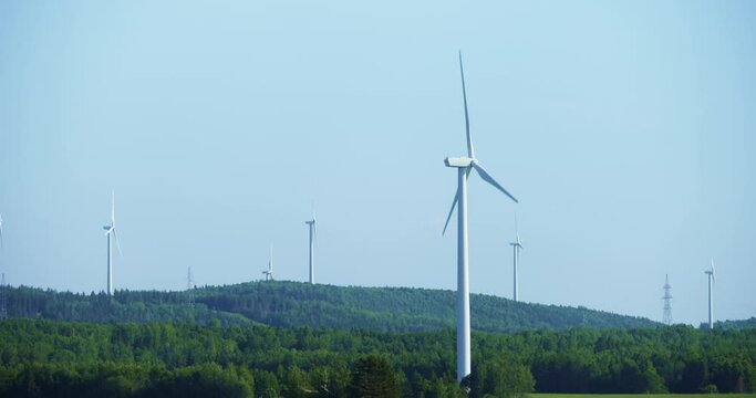 Windmill turbine and electric pylons / Matane