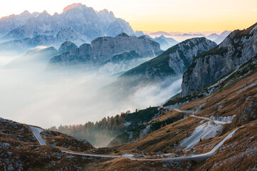 Road on Mount Mangart  Saddle in Autumn Misty Afternoon - Julian alps, Slovenia Europe