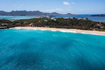 Aerial drone photos of islands in the Caribbean with blue sky and ocean