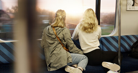 Women, back view and train window with travel, journey with commute or tourism, transportation and...