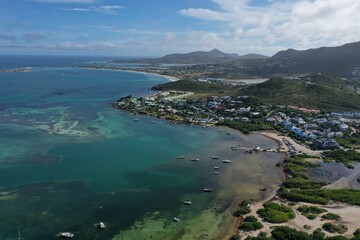 Aerial drone photos of islands in the Caribbean with blue sky and ocean
