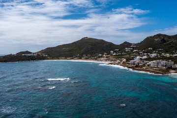 Aerial drone photos of islands in the Caribbean with blue sky and ocean