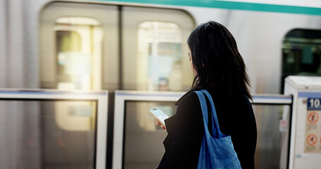 Woman, train travel and phone with back, bag and journey on metro railway with typing for web chat....