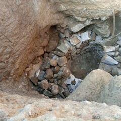  A hole in the rocks inside a clay hole.