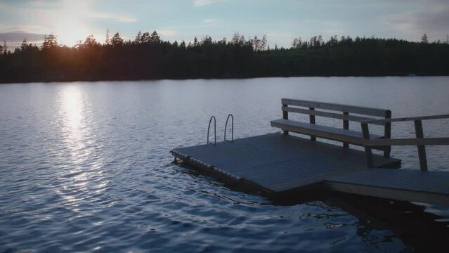 Swimming pier on a lake in Sweden during sunset