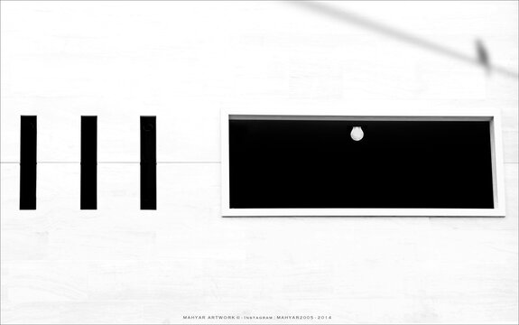 Minimal wall with windows and The shadow of the crow