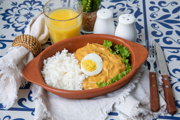 Aji de gallina chicken spicy cream served with rice traditional peruvian food