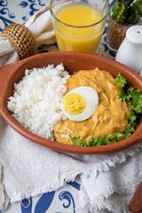 Aji de gallina chicken spicy cream served with rice traditional peruvian food