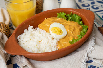 Aji de gallina chicken spicy cream served with rice traditional peruvian food