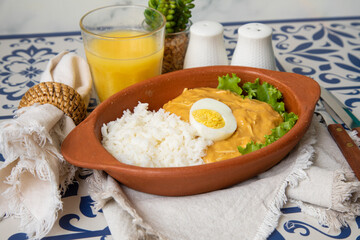 Aji de gallina chicken spicy cream served with rice traditional peruvian food