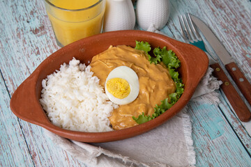Aji de gallina chicken spicy cream served with rice traditional peruvian food