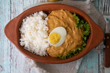 Aji de gallina chicken spicy cream served with rice traditional peruvian food